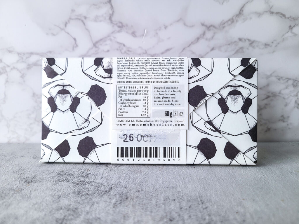 Back of Omnom cookies and cream white chocolate bar packaging 
